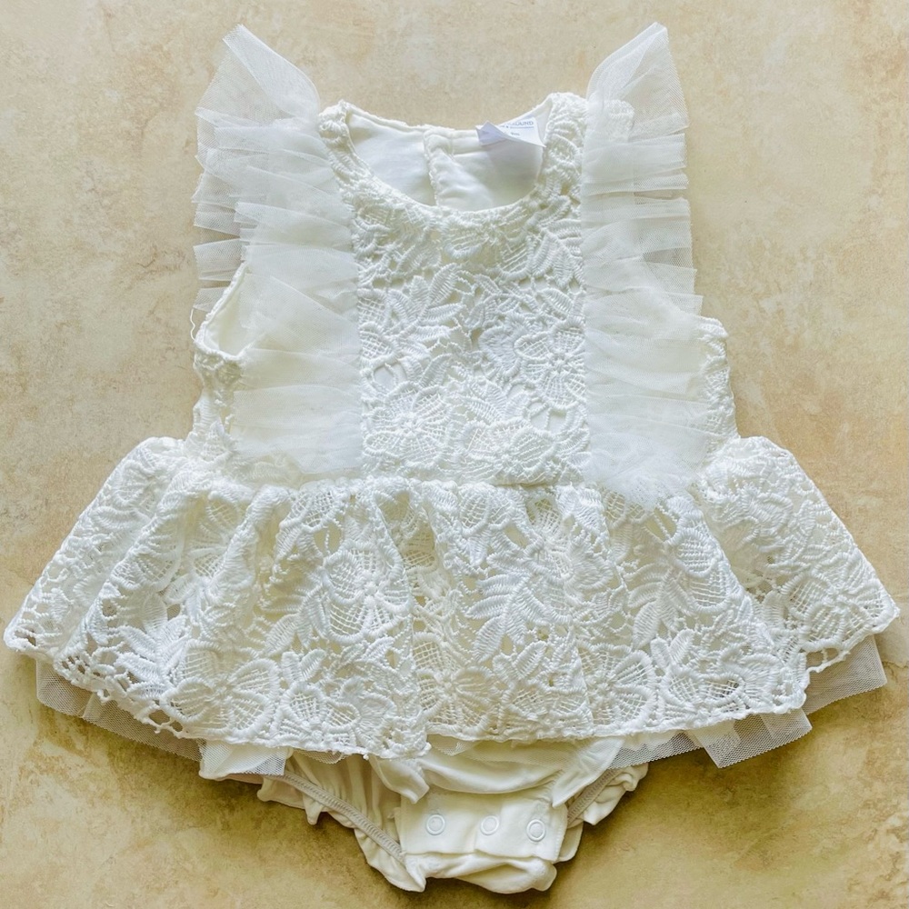 White lace baby onesie and bow head band  . Perfect for baptism . 9 months